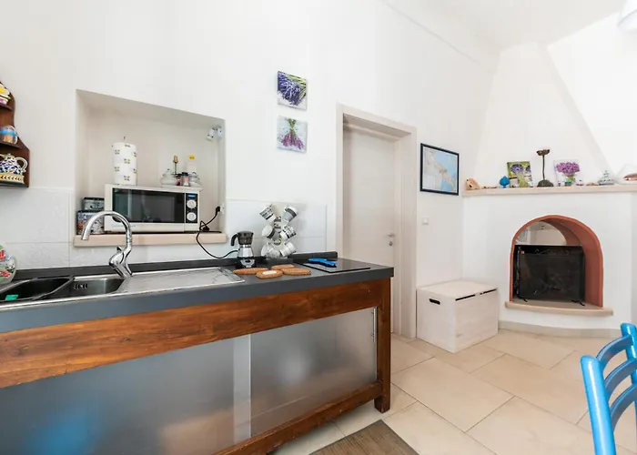 Дом отдыха Trullo E Casa Don Giulio 37